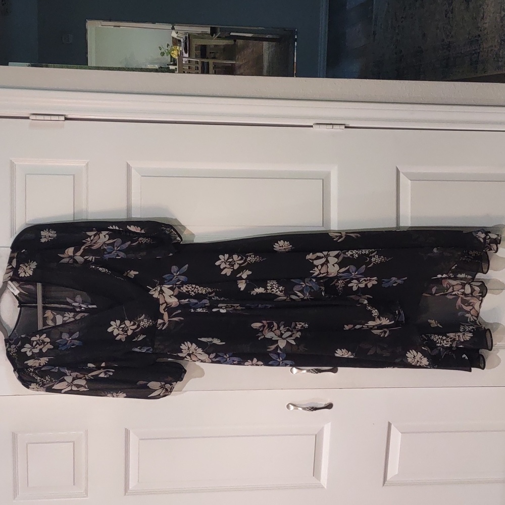 Calvin Klein size 10 black and floral dress. Zip up back with keyhole button.